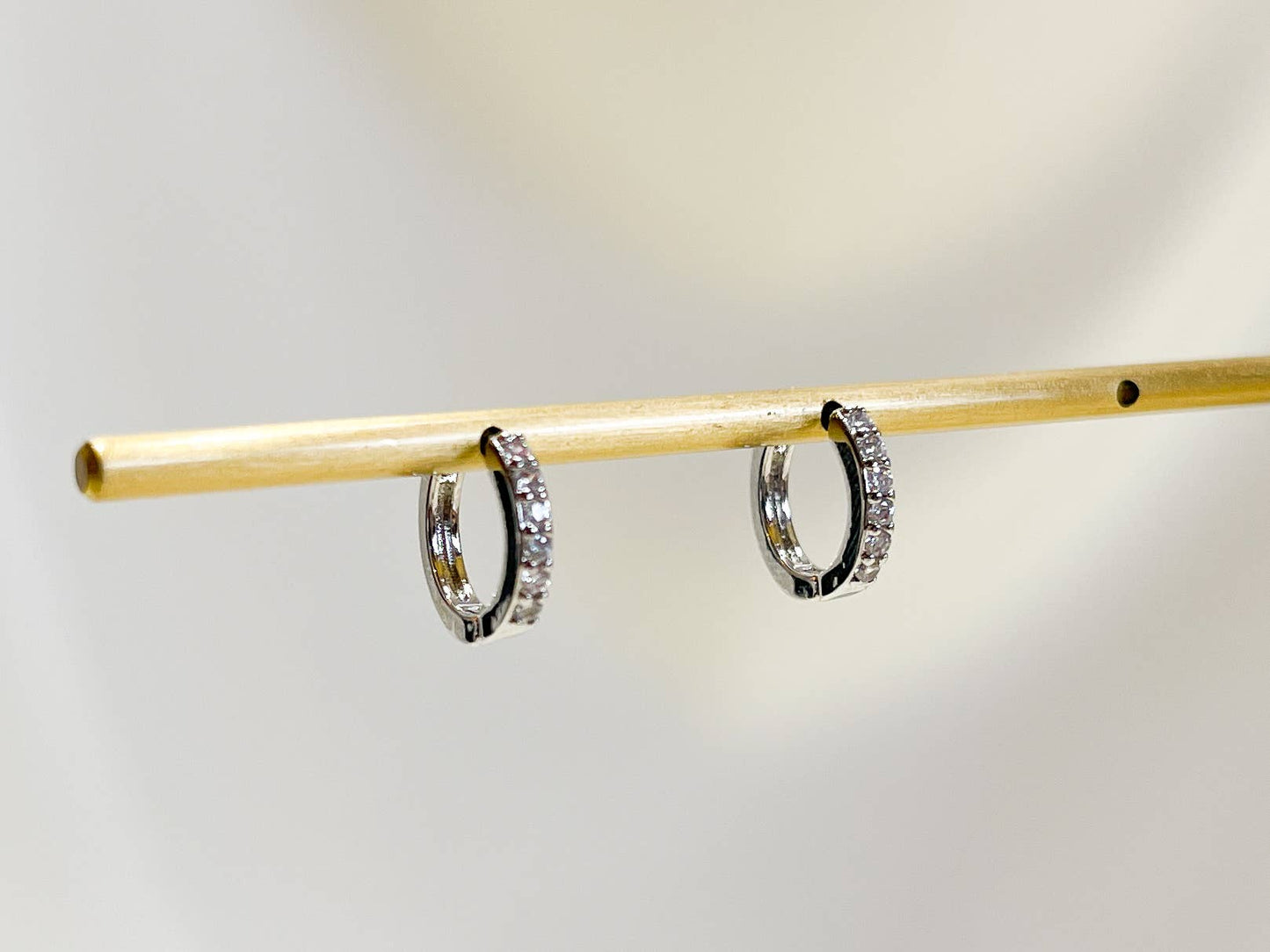 Paved huggie hoop earring