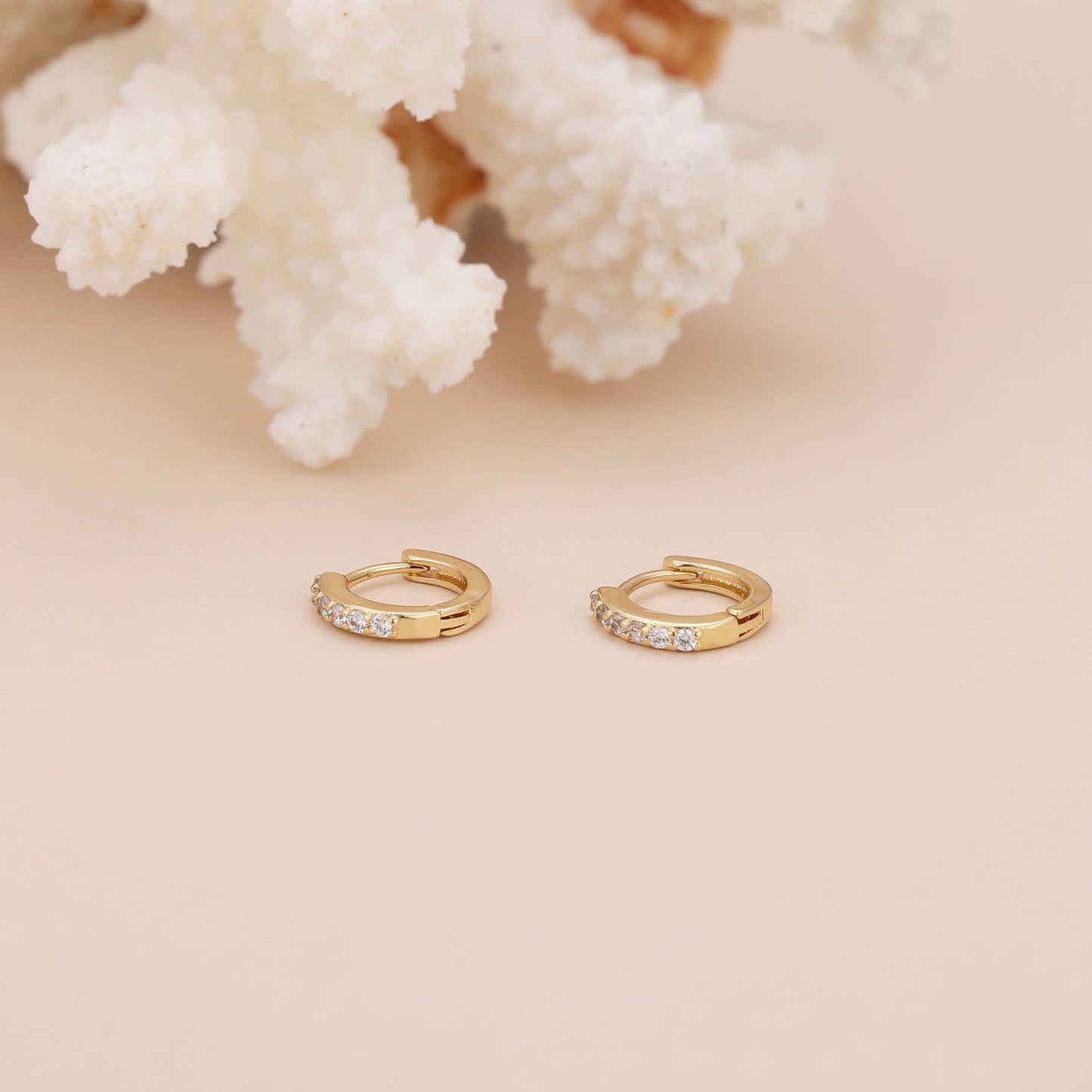 Paved huggie hoop earring