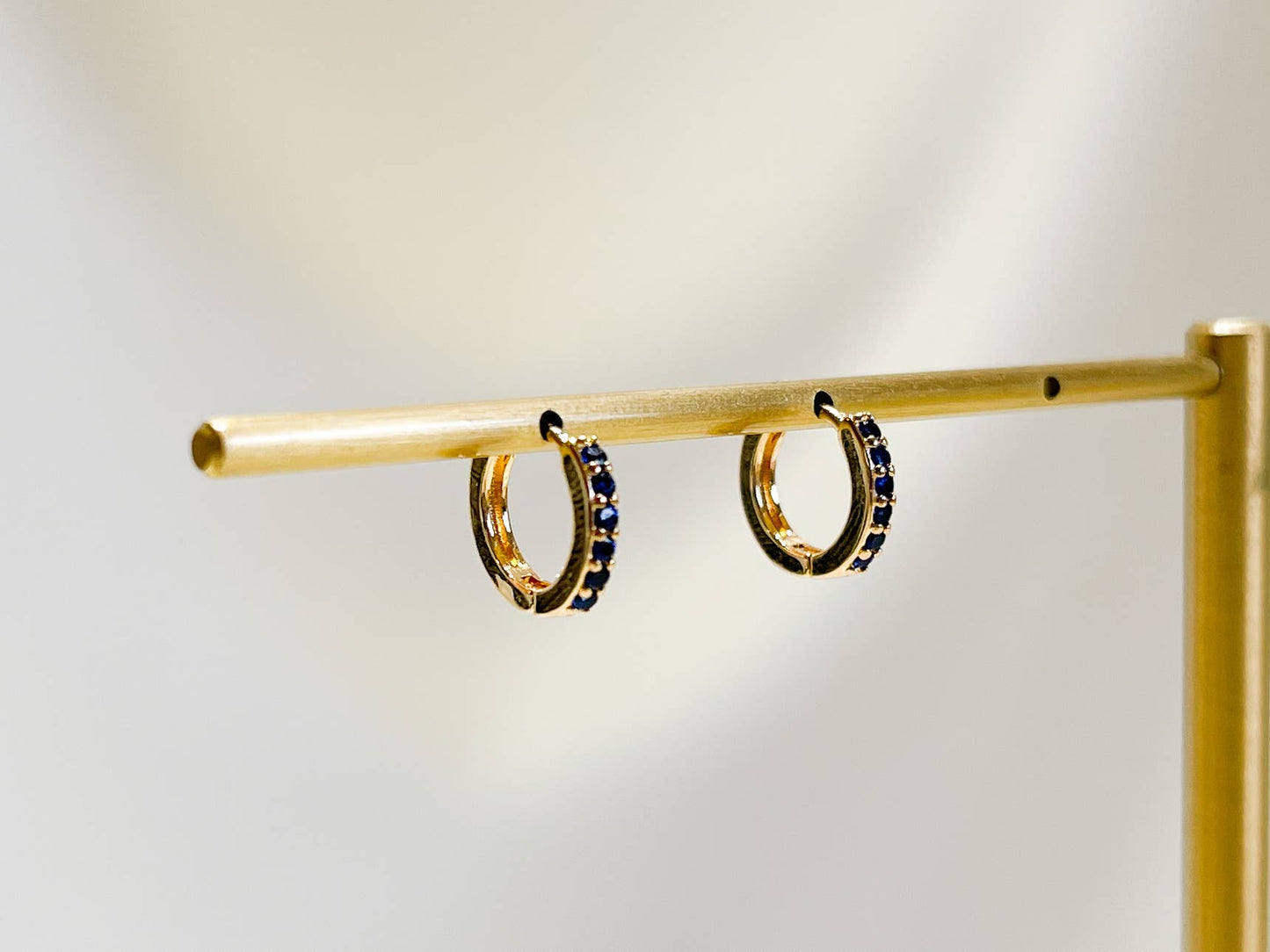 Paved huggie hoop earring
