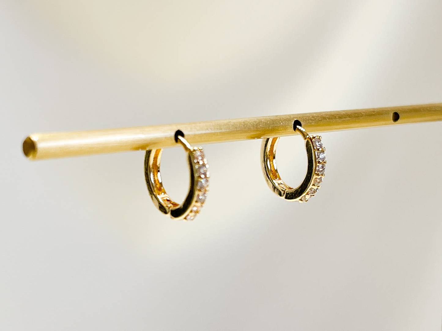 Paved huggie hoop earring