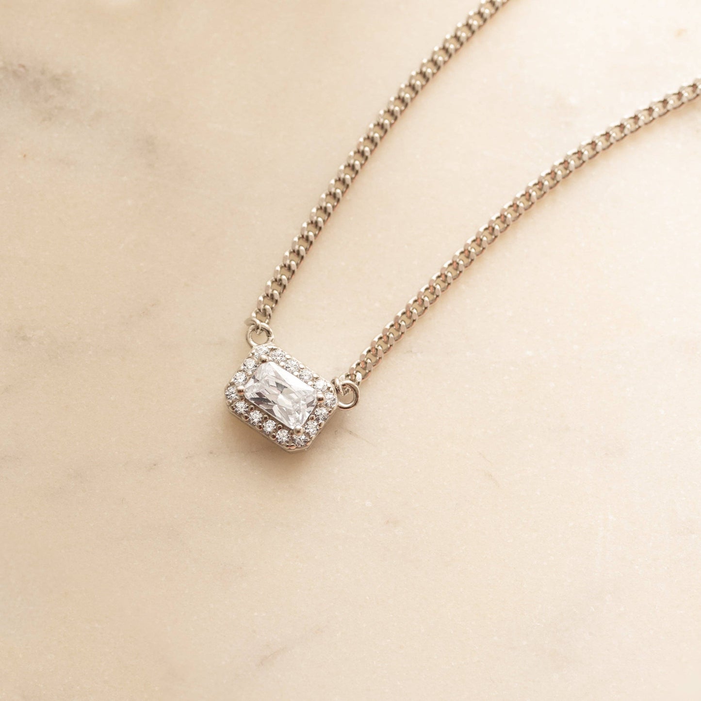 Halo Emerald Cut Necklace on Cuban Chain