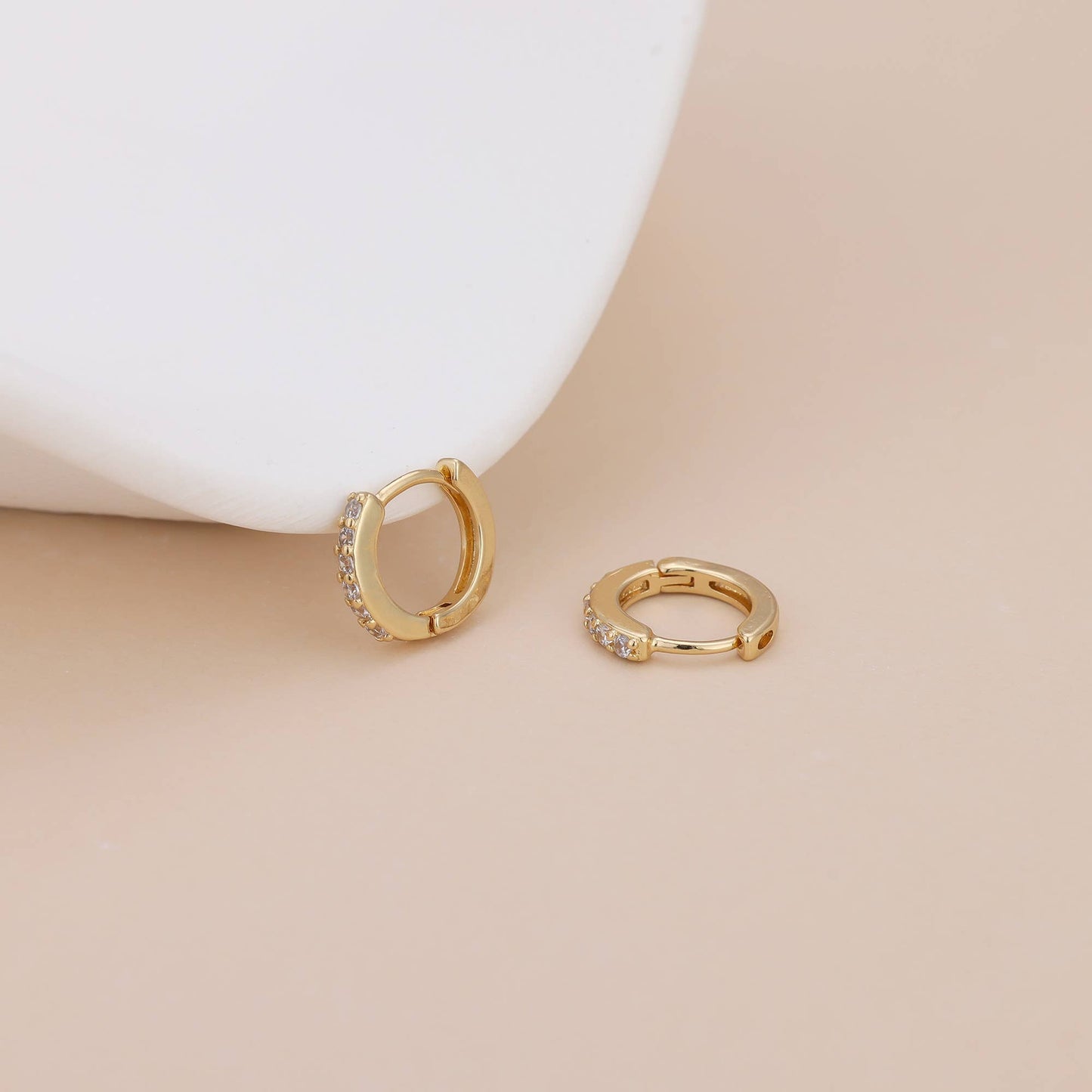 Paved huggie hoop earring