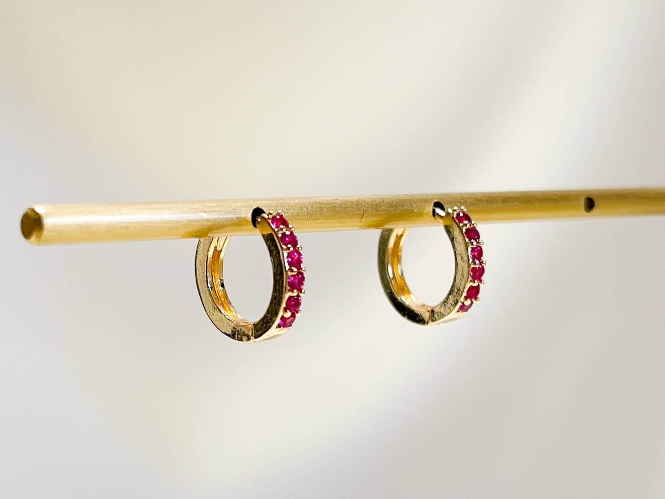 Paved huggie hoop earring