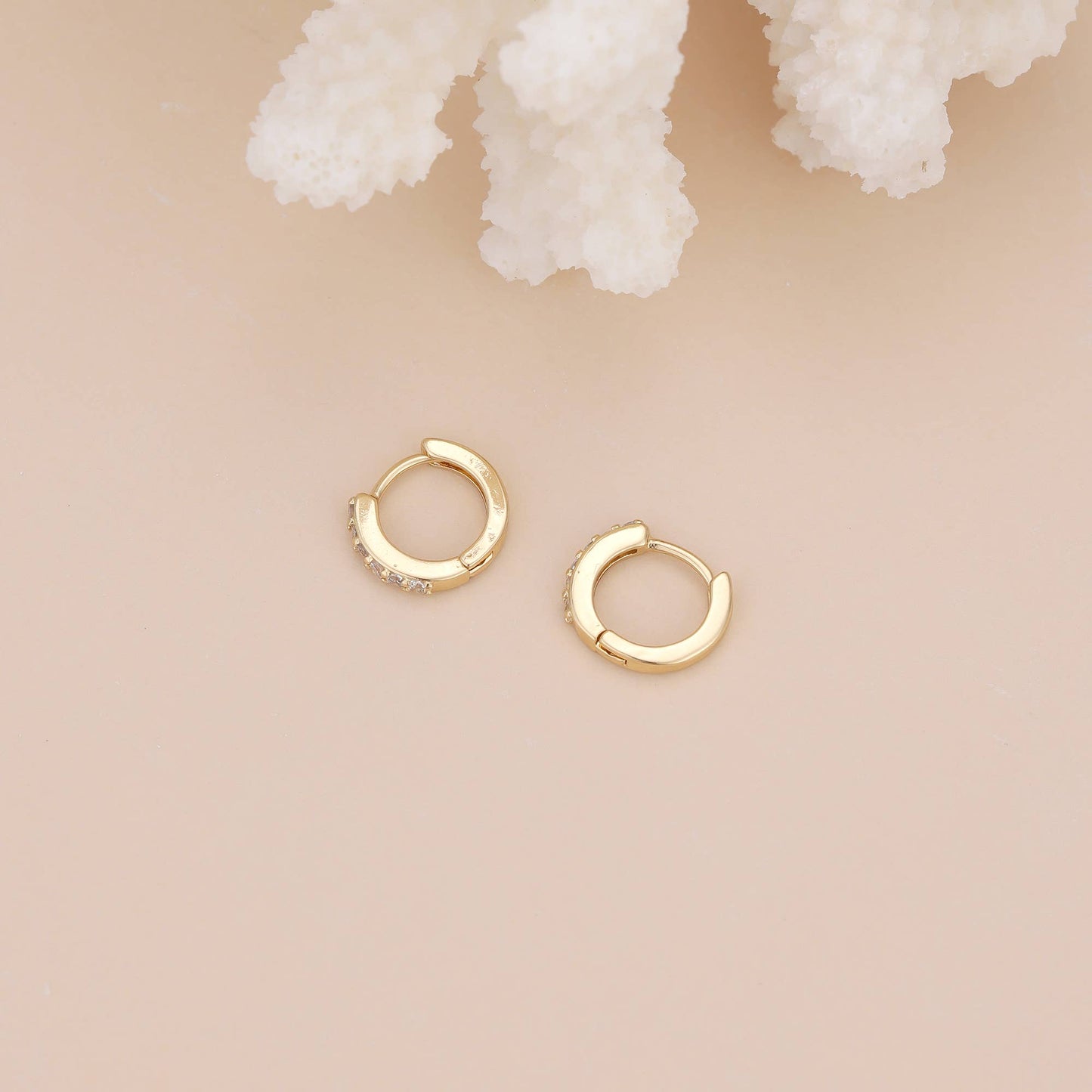 Paved huggie hoop earring